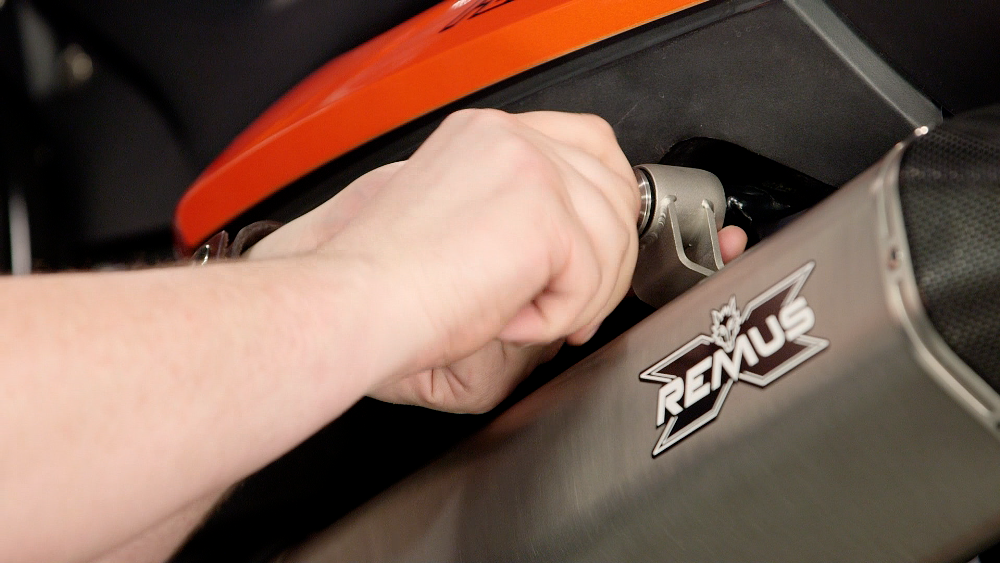 Finger Tightening A Muffler Bracket