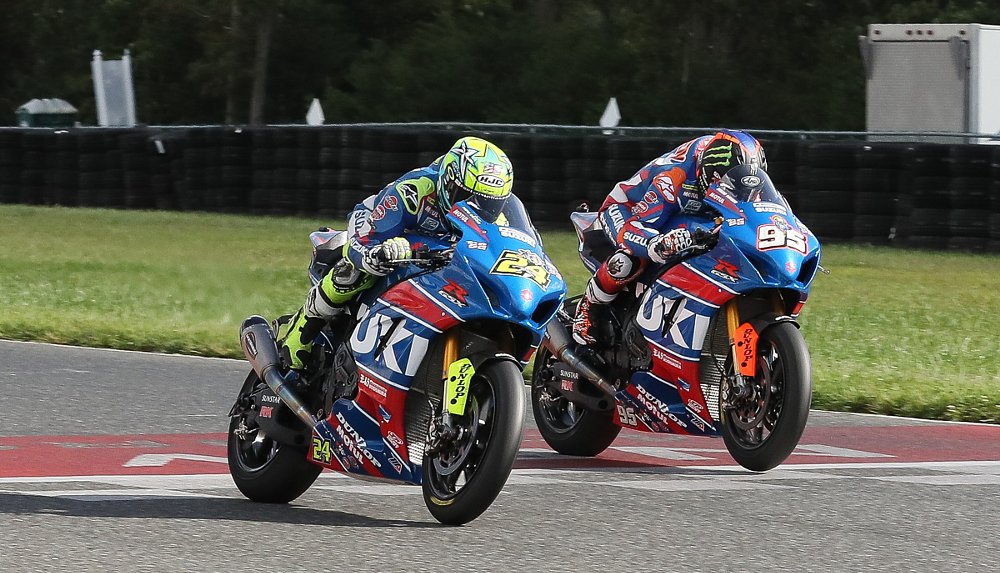 Toni Elias and Roger Hayden at the finish line