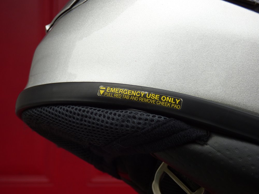 helmet emergency tabs