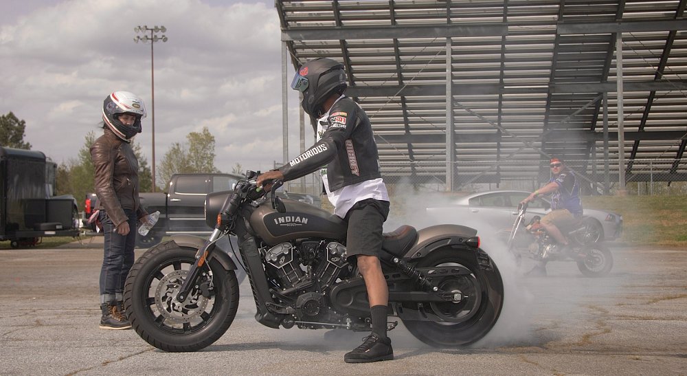 Rickey Gadson demonstrates a burnout on the Indian Scout