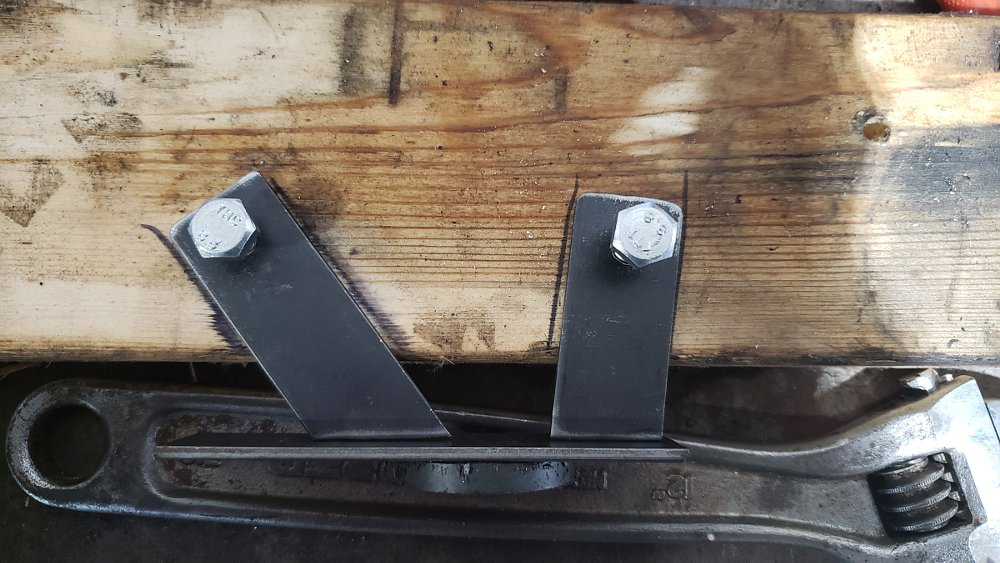 fabricating a bracket for the coolant catch can