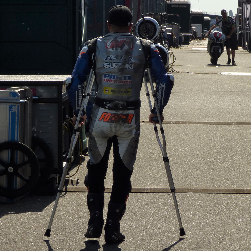 Bobby Fong on crutches