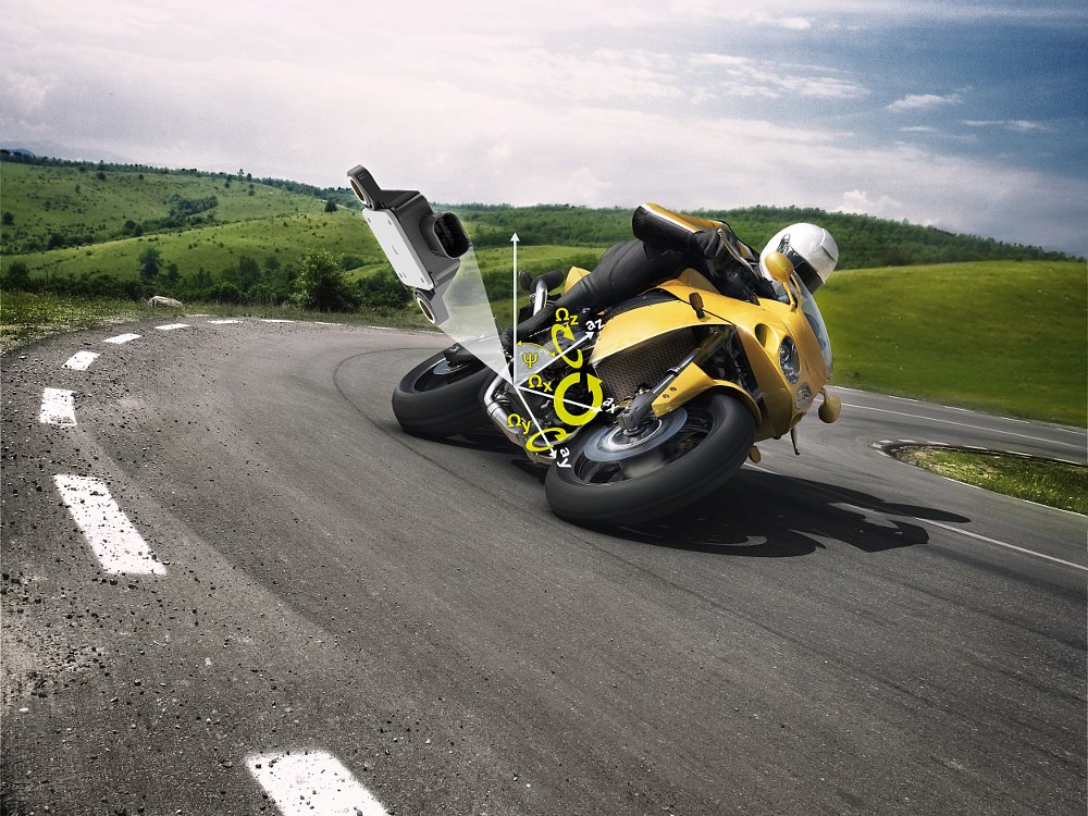 rendering of a motorcycle in a turn with an illustration of electronics working