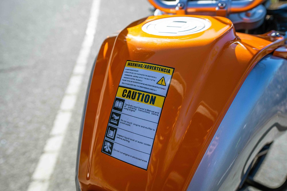 CSC RX4 warning sticker on gas tank