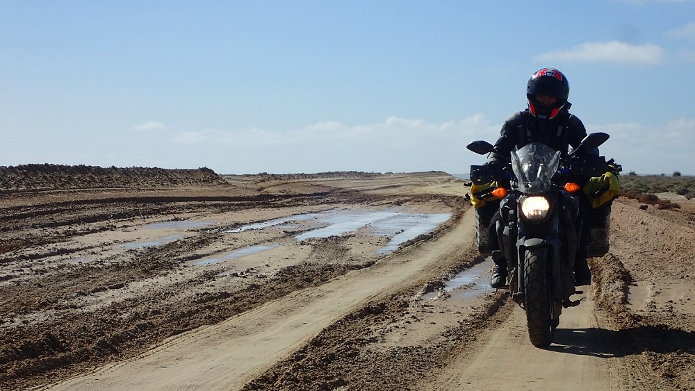 riding the FZ-07 on a muddy road