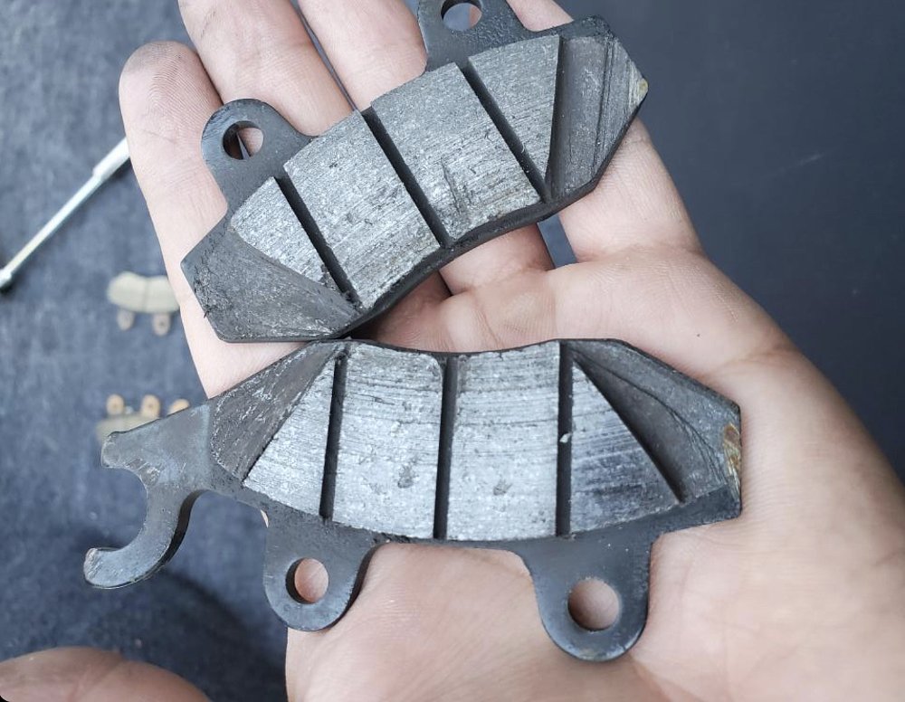 Beveled motorcycle brake pads