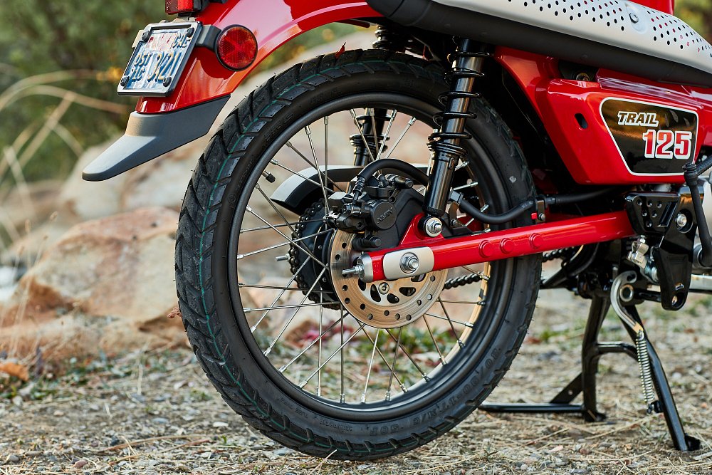 Right side of the rear wheel of the Honda Trail 125