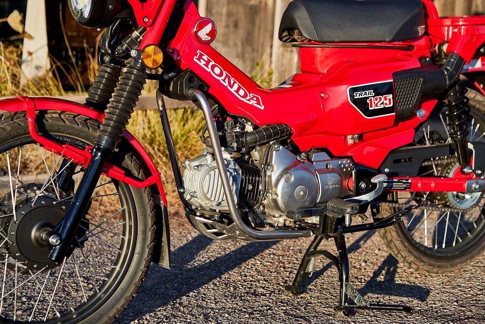 Up close on the left side of the engine of Honda's Trail 125