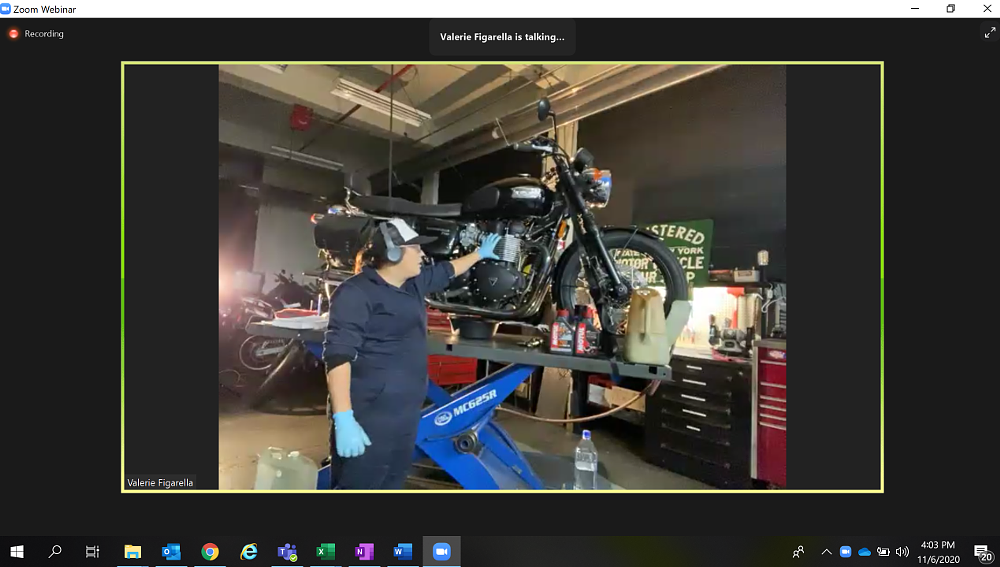 Valerie Figarella of Motogrrl Garage demonstrates an oil change