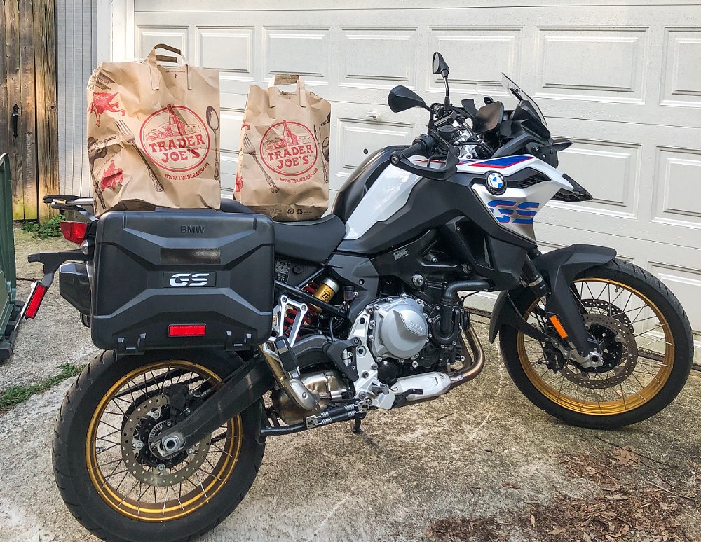 bringing home the groceries on a motorcycle