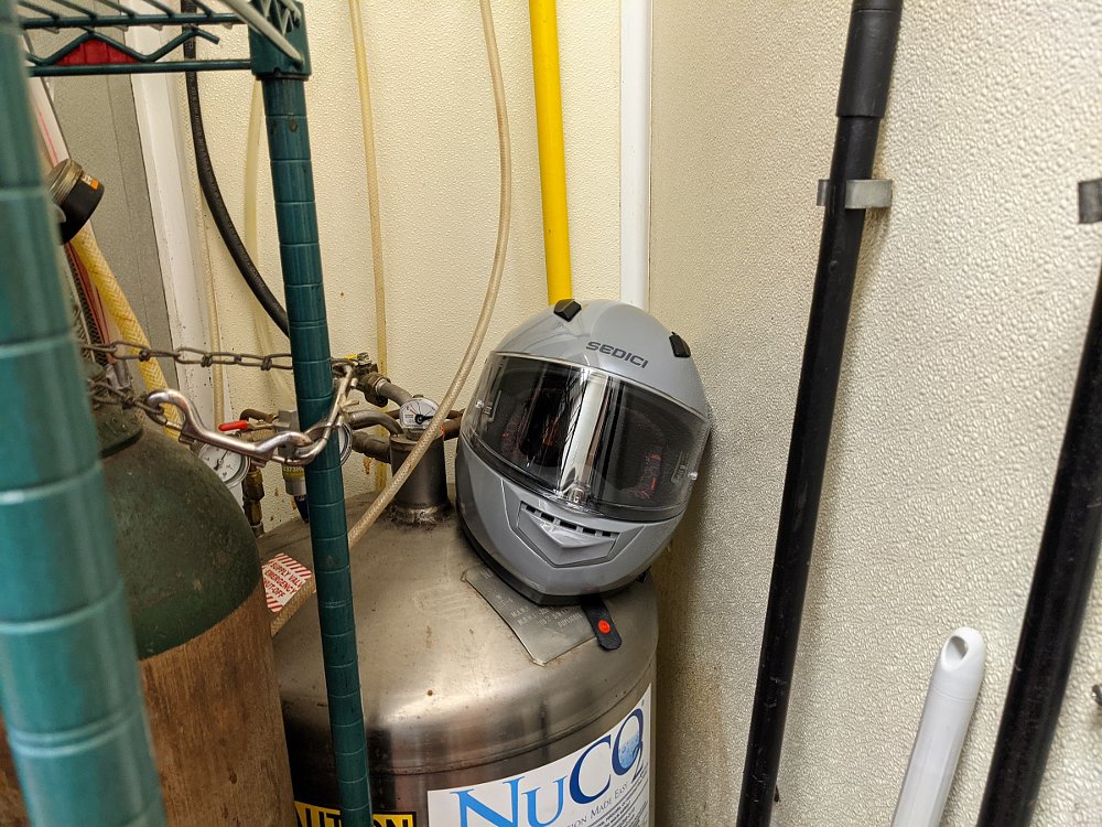 helmet stored among some shelves