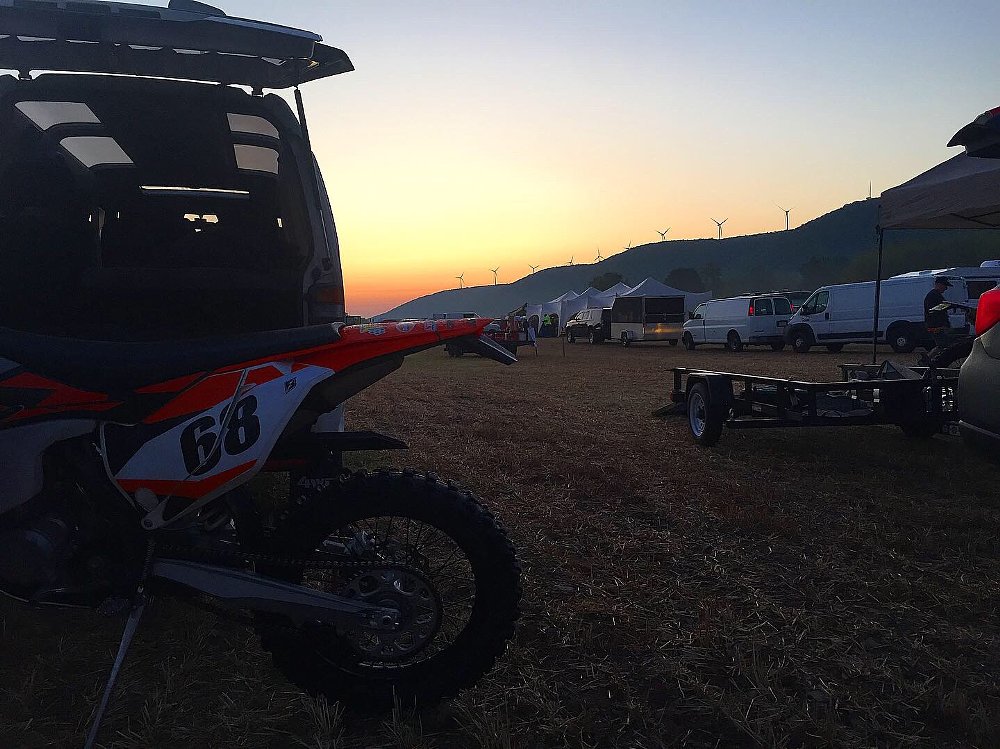 Van camping before dirt bike enduro. Sunrise in the valley.