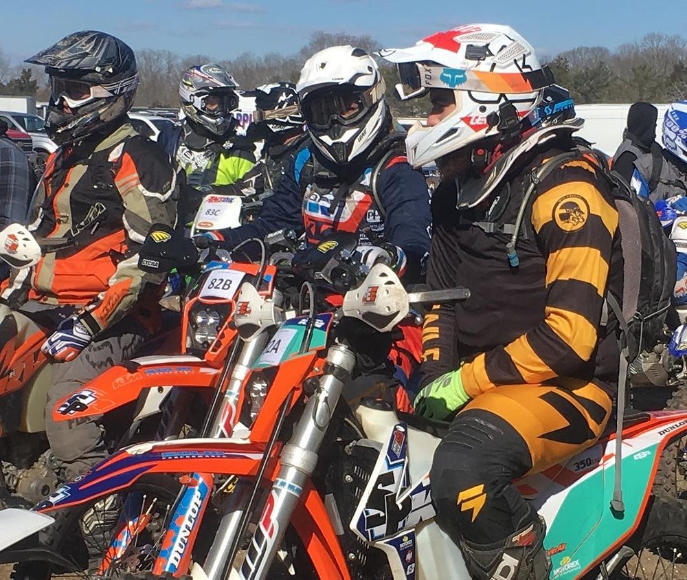 Riders waiting to compete in enduro at starting line