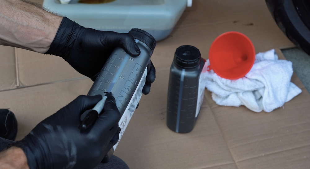 Measuring engine oil.