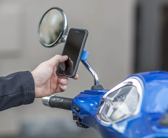 I'd recommend using the mirror to mount your cell phone on a scooter.