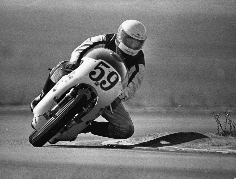 racing the TZ250A at Ontario Motor Speedway