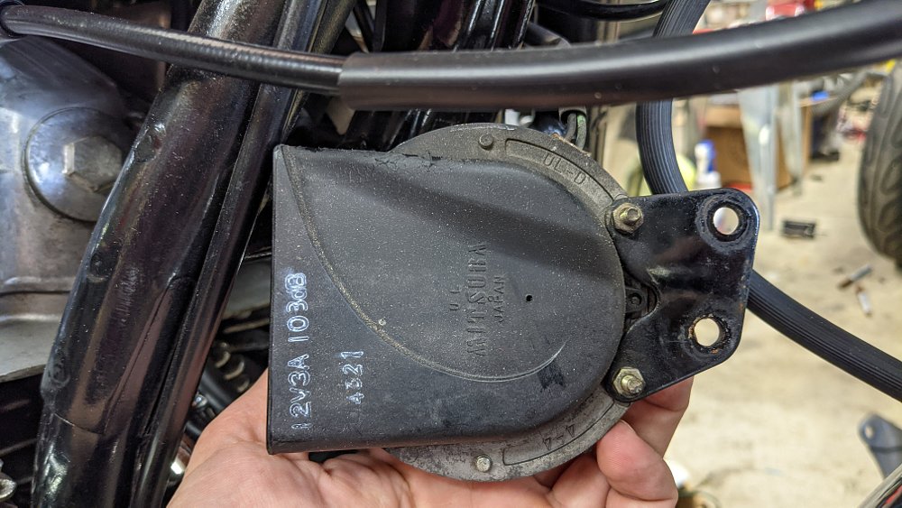 Motorcycle horn with snail