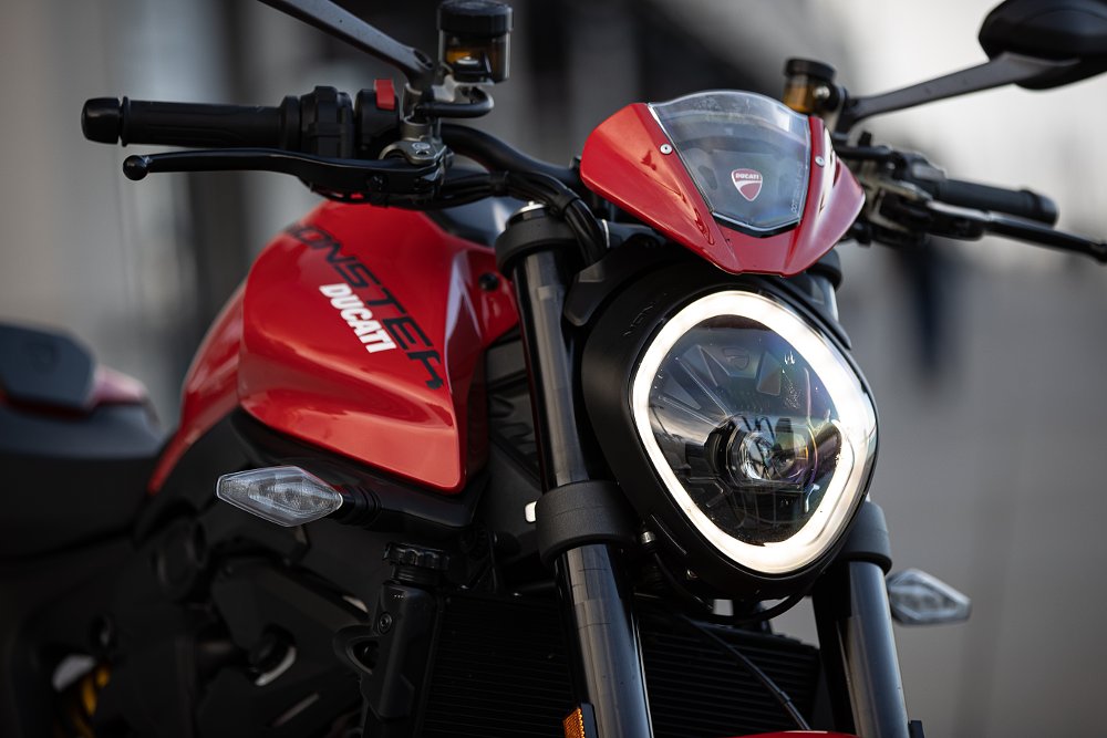 A close up of the Ducati Monster LED headlight with DRL halo light around it