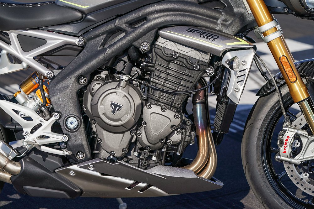 A close up view of the motor of the Triumph Speed Triple 1200 RS