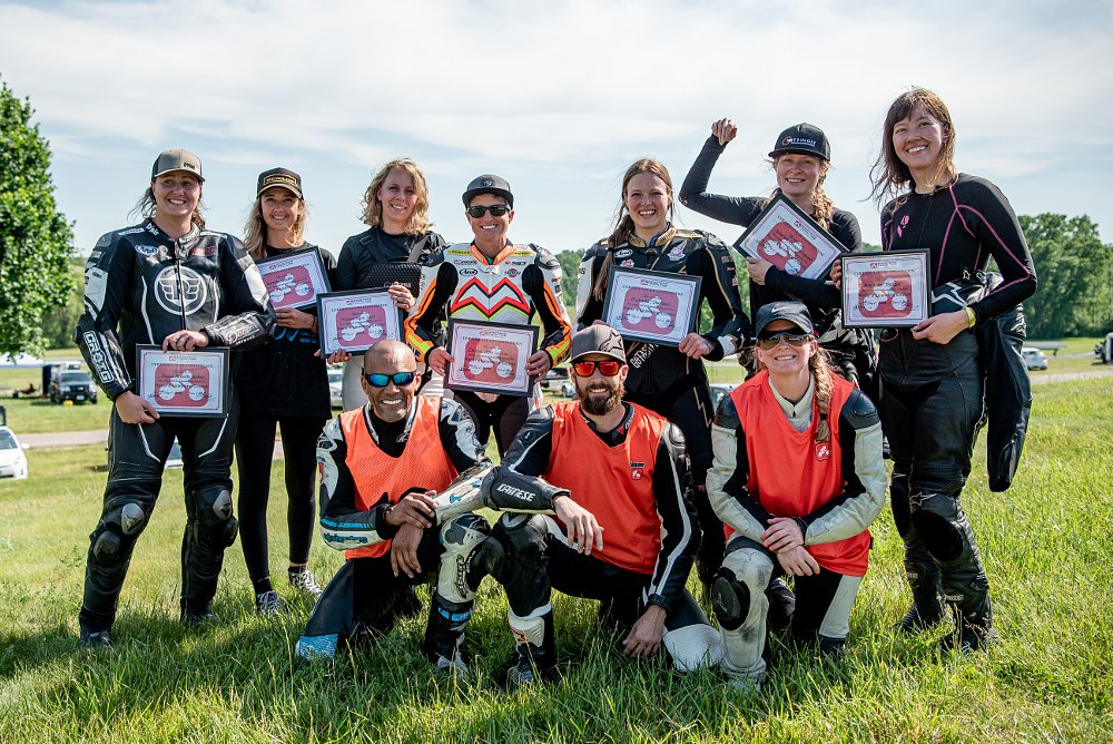 The group of 7 BTR riders pose with their new racer certificates from Sportbike Track Time school.