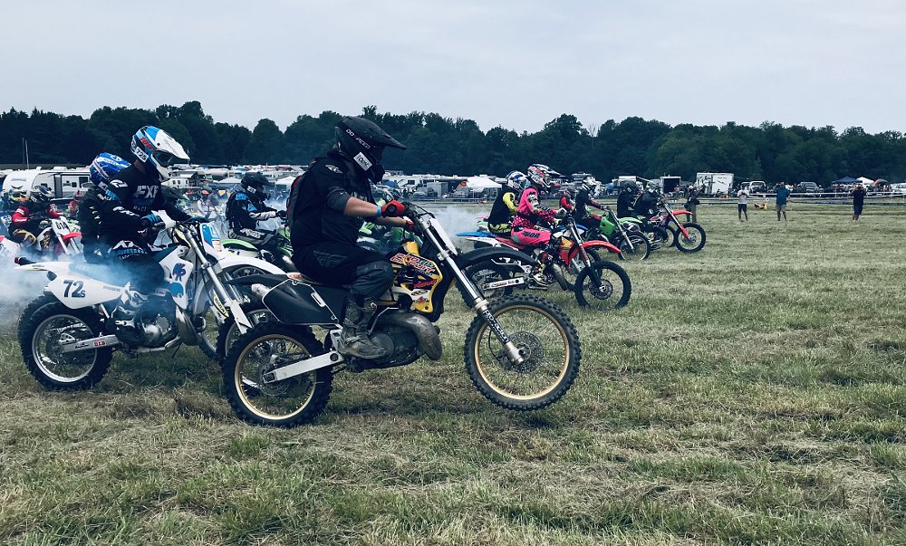 cross-country race takes off in a haze of blue smoke