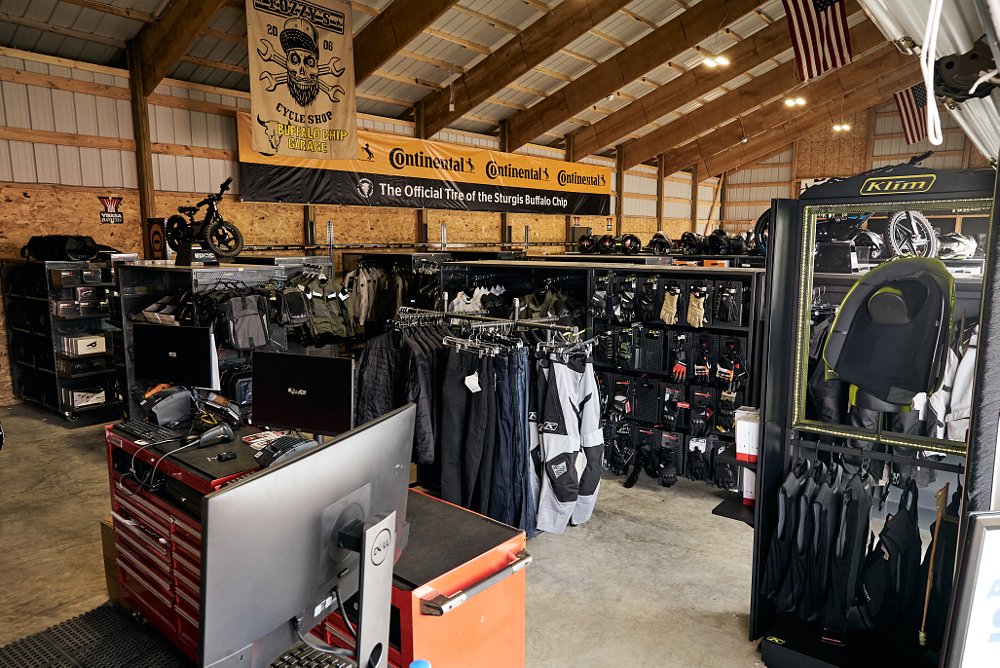A view inside the Adventure Store full of motorcycle equipment and gear.