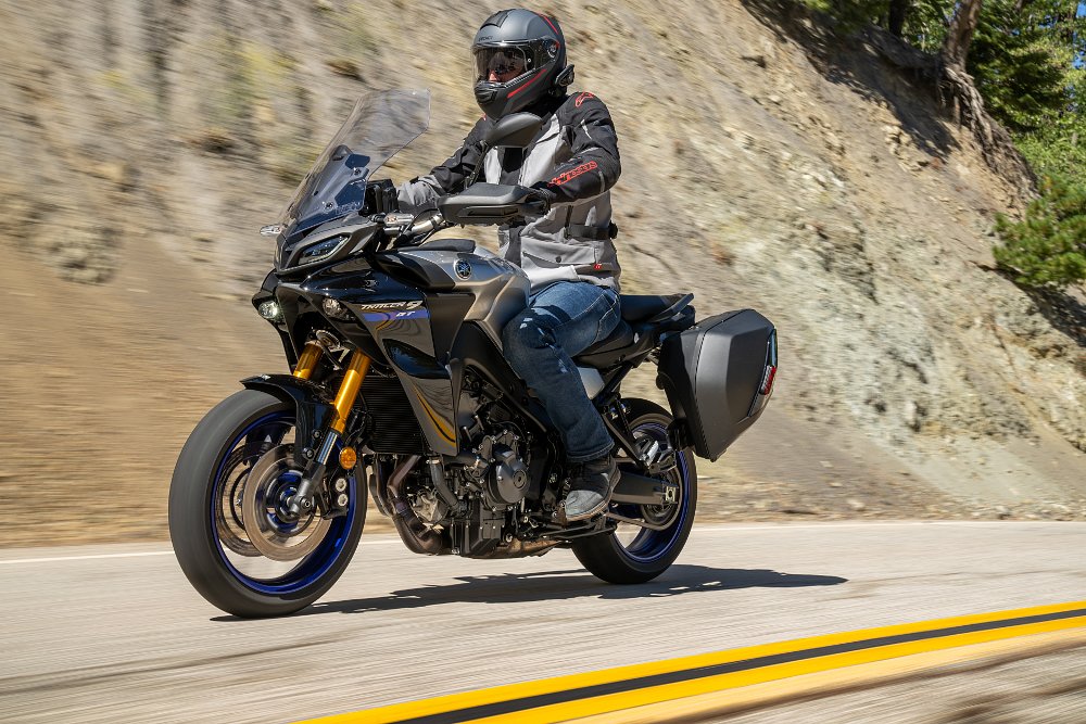 2021 Yamaha Tracer 9 GT left side while riding down a two-lane road