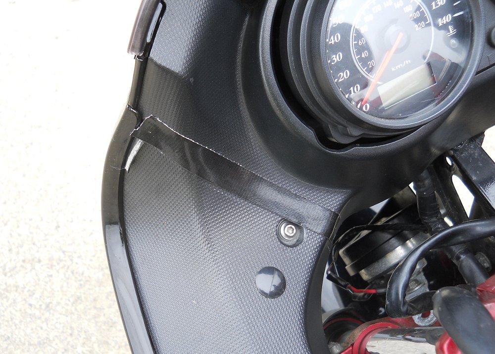 dash with tape repair