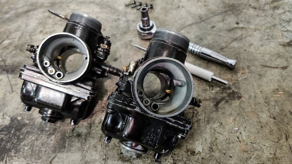 carburetors being worked on