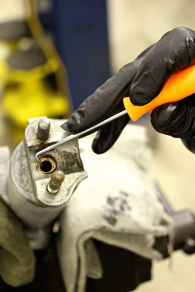 working on restoring motorcycle parts