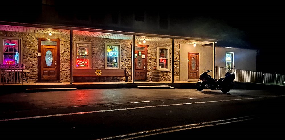 Honda Gold Wing parked outside after dark