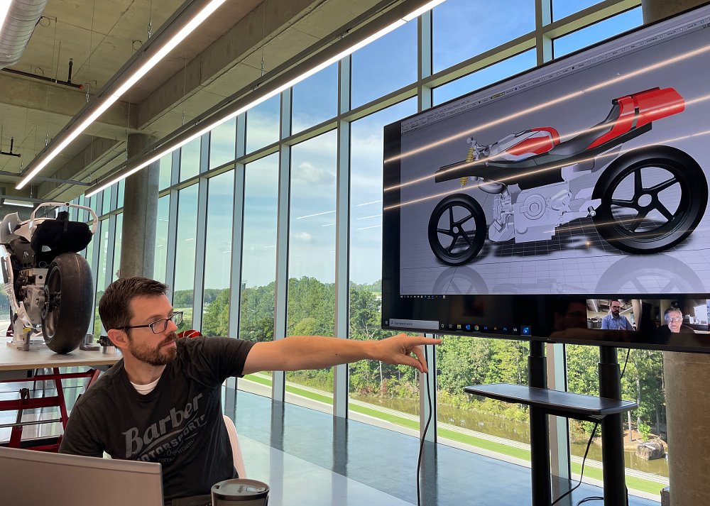 Brian Case working with collaborators on computer screen