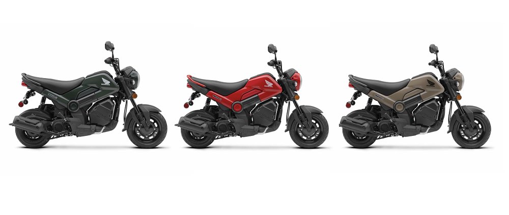 The Honda Navi in three other colors, brown, red, and dark green.
