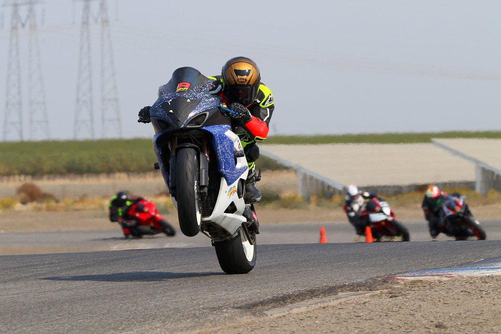 Ari riding Dave the Gixxer on the track