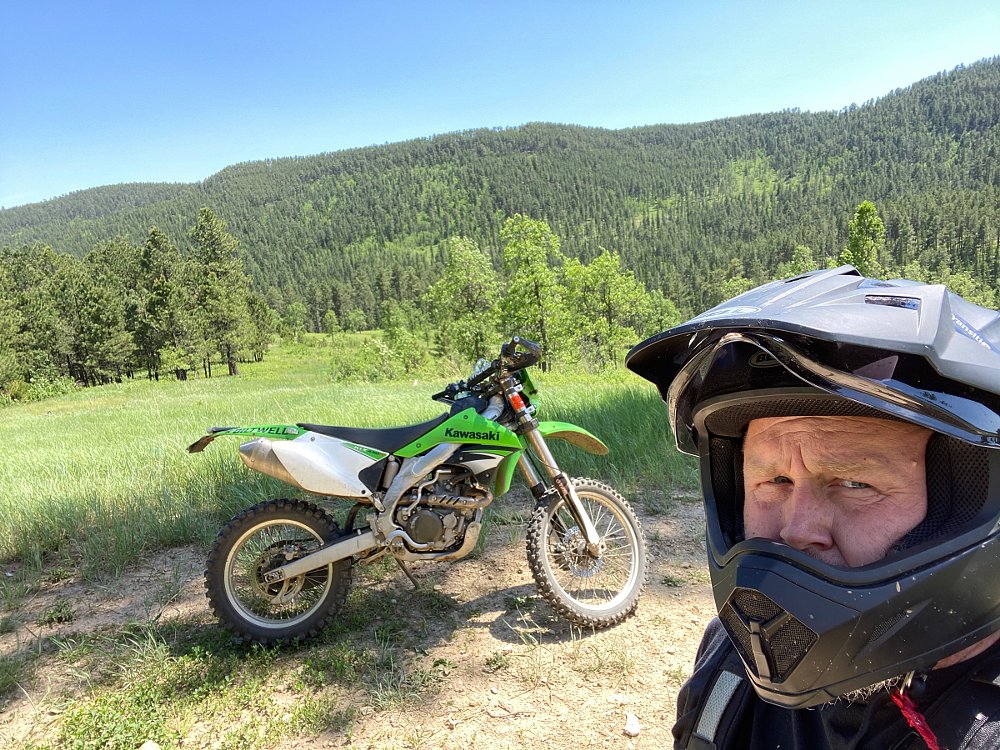 Patrick takes a selfie on the trail