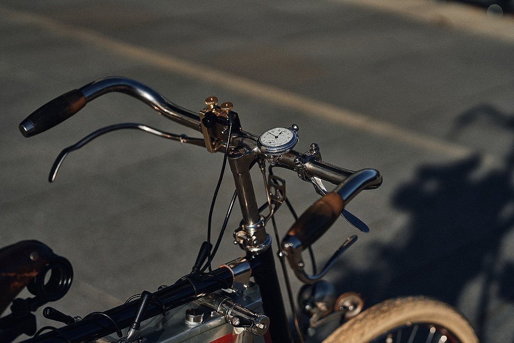 pocketwatch on the handlebar of the Triumph prototype