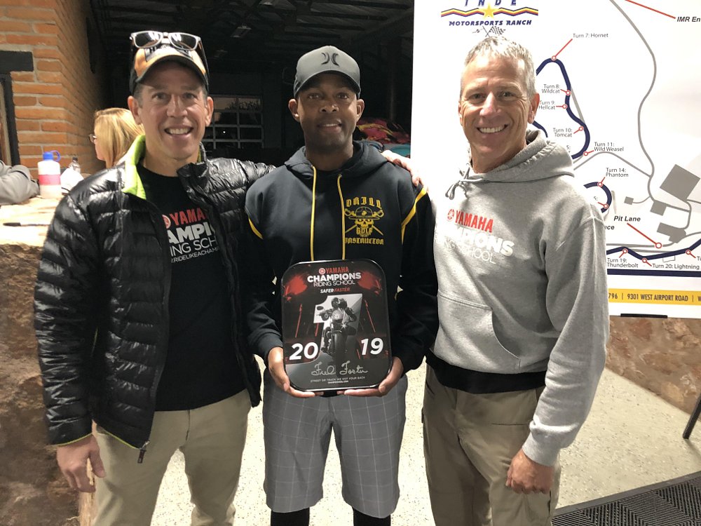 Fred poses with two motorcycle instructors from the YCRS training school