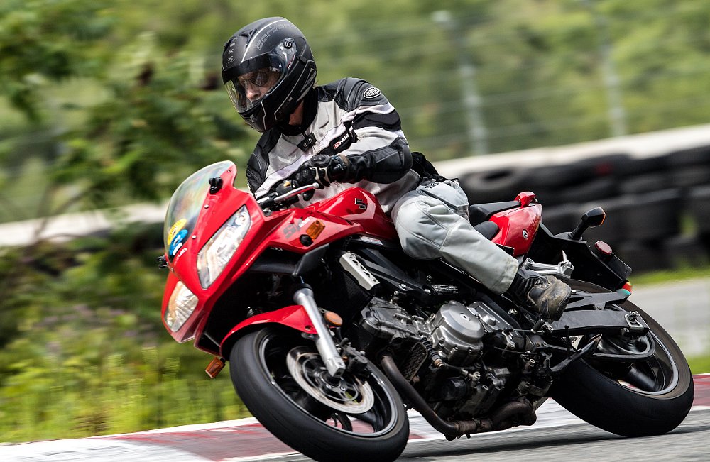 Bill Dutcher riding on the track