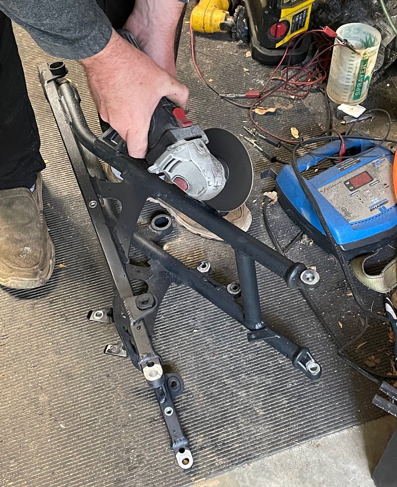 grinding off the footpeg mounts on the subframe