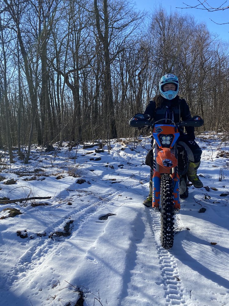 Liz on her motorcycle in the snow