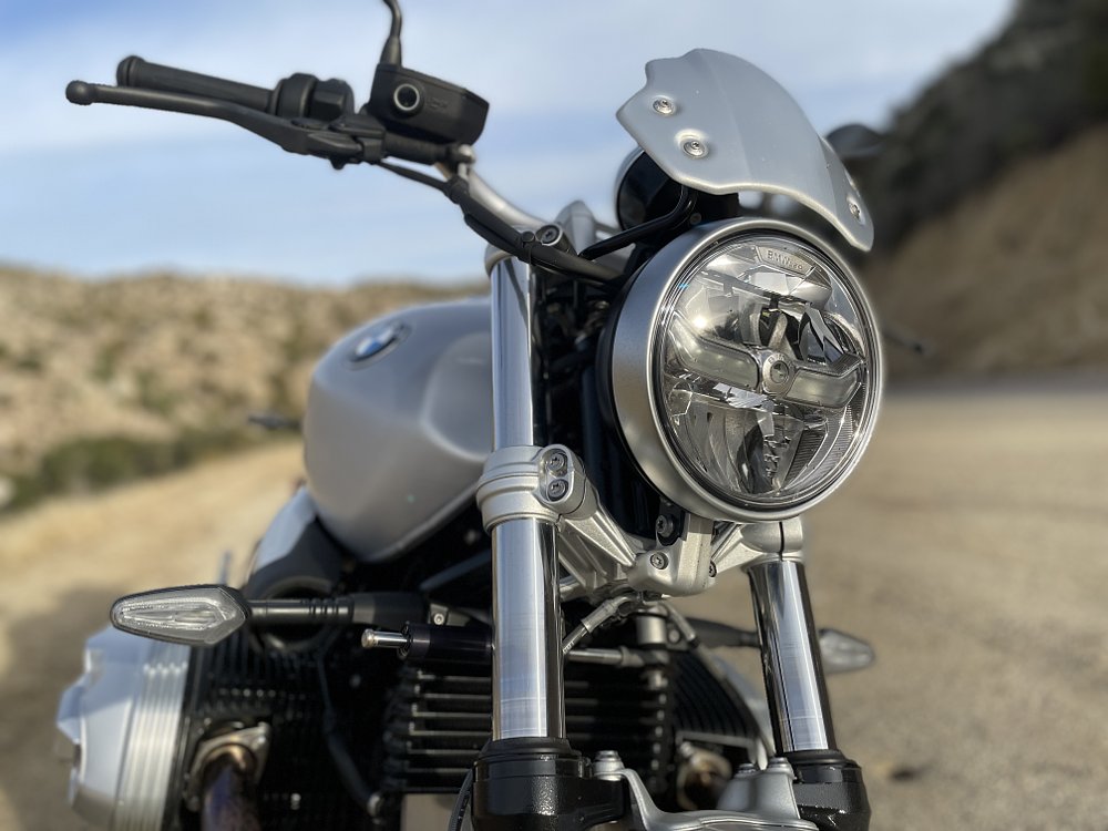 A close up view of the BMW R nineT round LED headlight