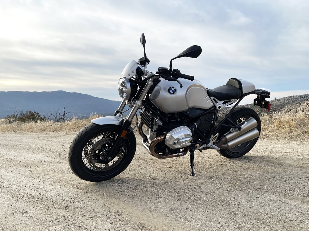 A front 3/4 view of the BMW R nineT Pure motorcycle with cloudy skies