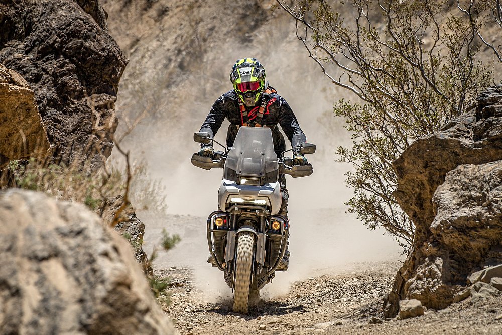 riding in the Mojave Desert between cliffs