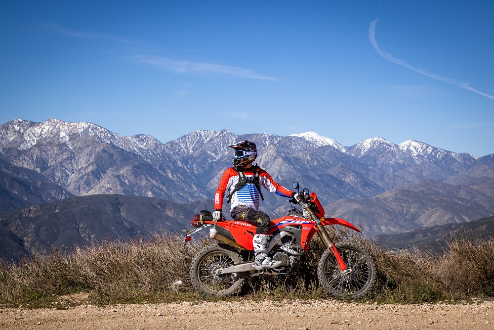 CRF450RL with snow covered mountains. 