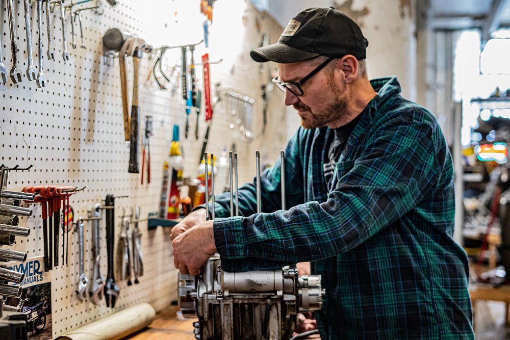 Brian Schaffran works on an engine