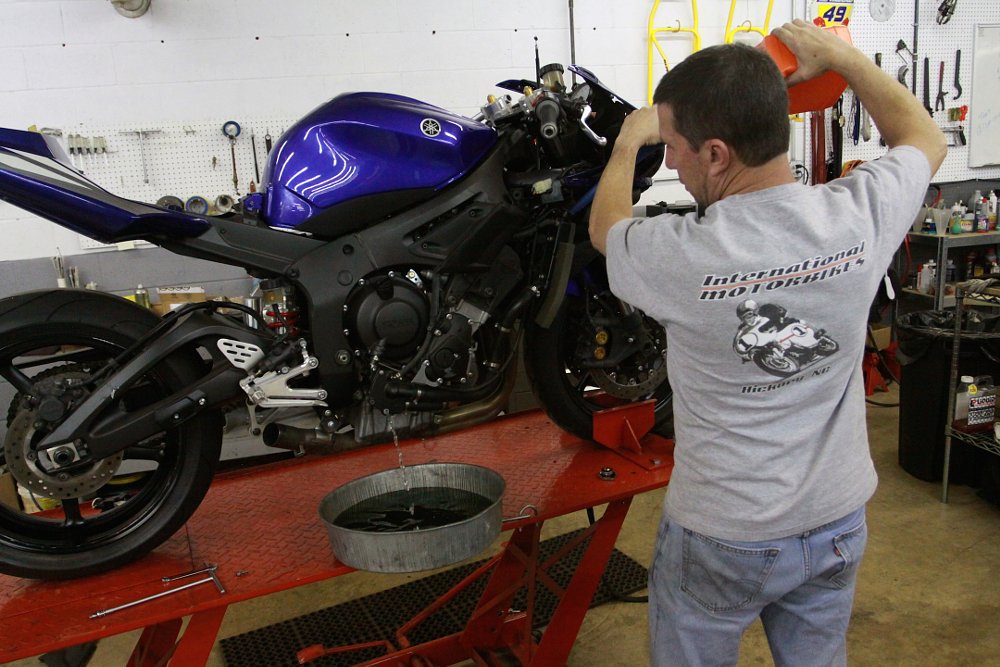 Harry Vanderlinden works on the Yamaha YZF-R6 in the shop