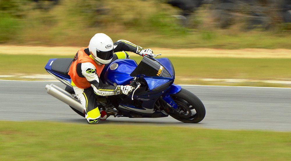 Neale riding the Yamaha YZF-R6 on the track