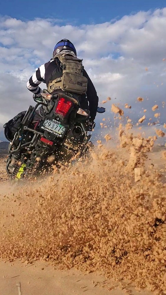 roosting dirt off-road on a motorcycle