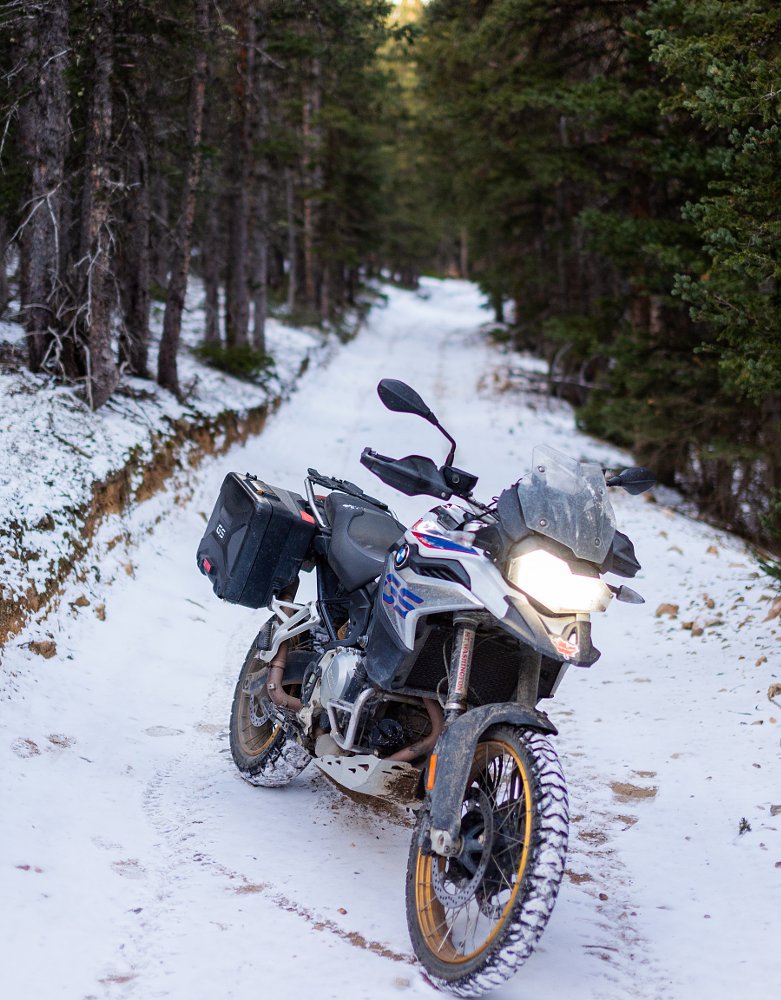 BMW F 850 GS on a snowy dirt road