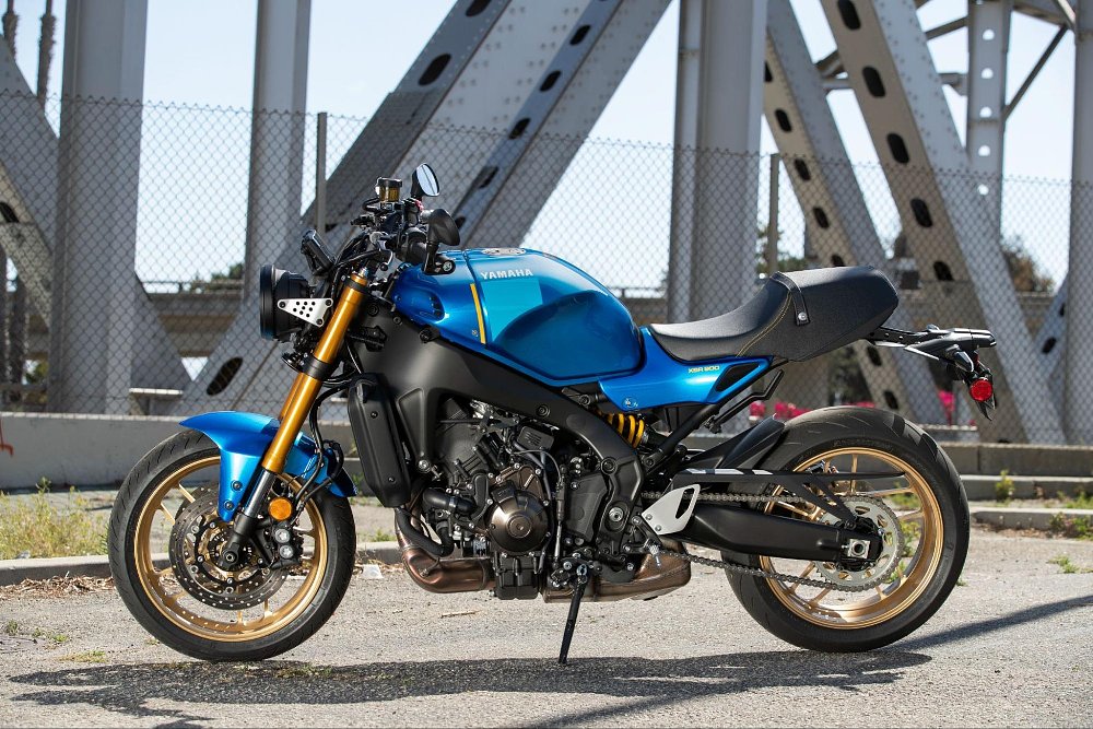 A side profile view of the blue yamaha XSR900 naked bike